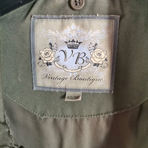 Women's jacket used olive color size M