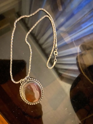 Vintage necklace with large brown stone and silver metal