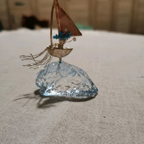 Table lucky charm like new with sailboat figurine