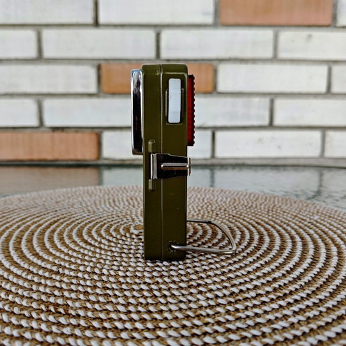 Vintage metal pocket flashlight, khaki