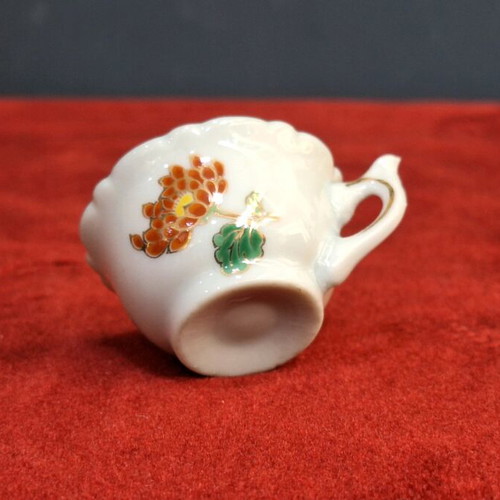 Japanese porcelain cup used with hand-painted chrysanthemum