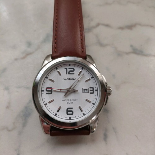 Casio men's watch like new with stainless steel and brown leather