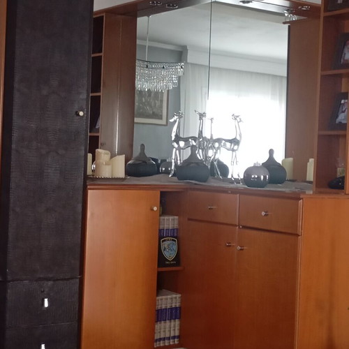 Corner reception furniture with mirror and storage, brown and faux leather