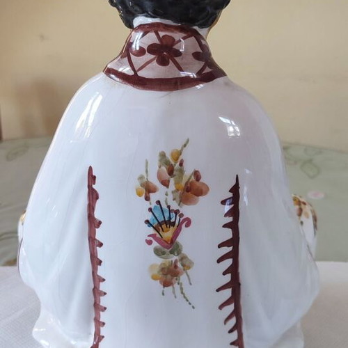 Vintage porcelain Buddha statue with gold details
