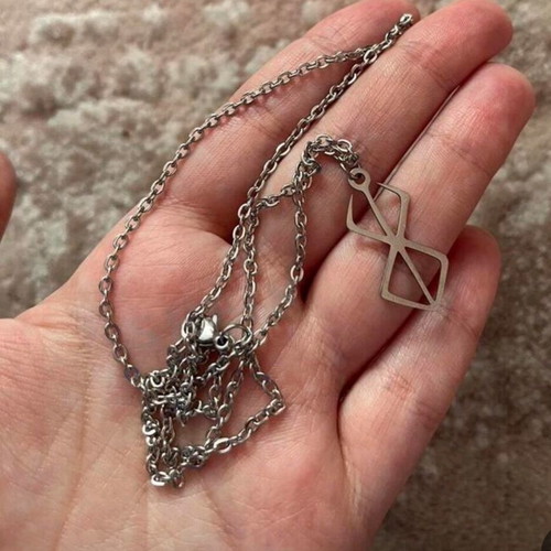 Berserk pendant like new from the eponymous anime