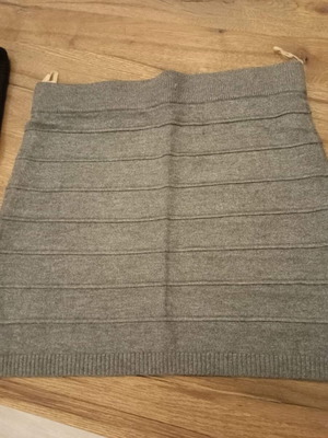Pink Woman medium skirt slim fit, short, like new, gray