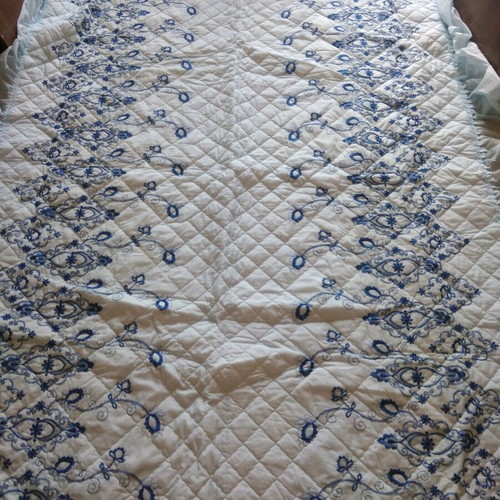 Quilted bedspread new, sky blue with flounces