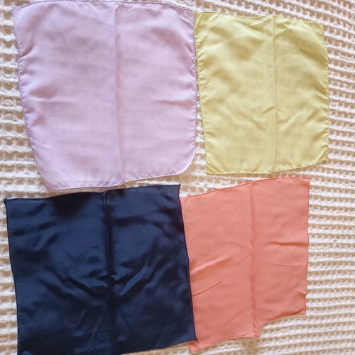 Vintage set of 4 fabric pocket squares in assorted colors like new