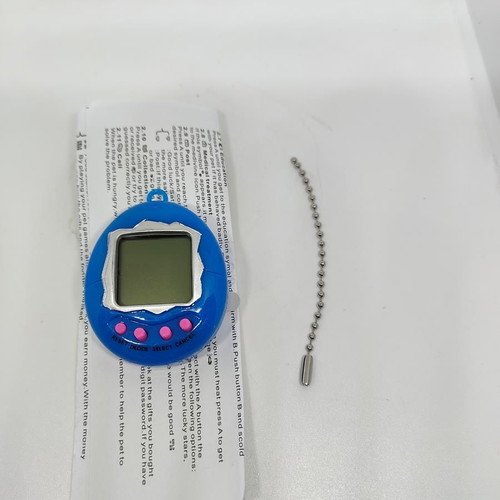 Tamagotchi Retro 90s Electronic Pet blue, like new
