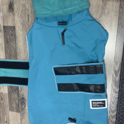 Waterproof dog jacket like new with fleece lining in petrol color