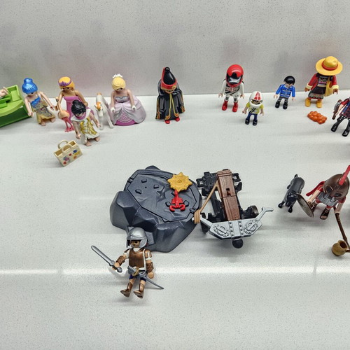Playmobil figures set like new with catapult and accessories