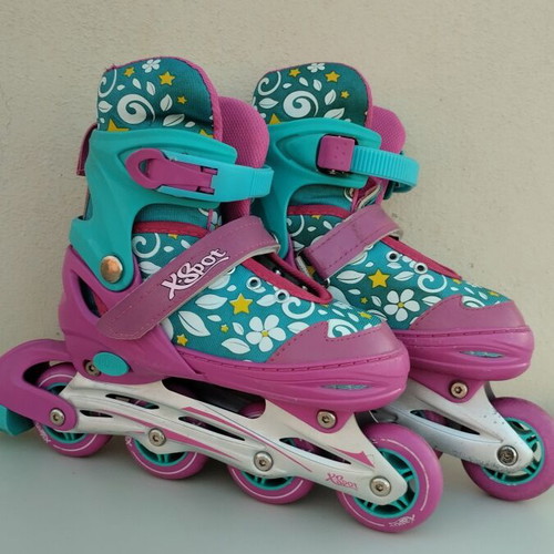 Xspot adjustable rollers size 35/37 used, turquoise pink with flowers