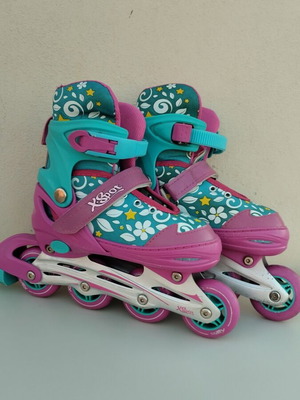 Xspot adjustable rollers size 35/37 used, turquoise pink with flowers