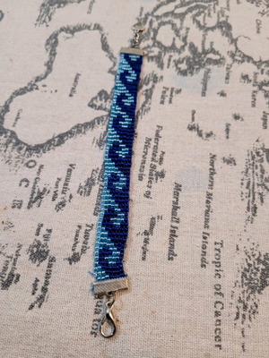 Beaded bracelet like new, blue and silver, sea waves design