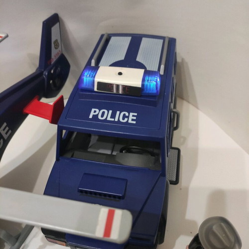 Playmobil police set with helicopter, 2 cars, motorcycle, boat and 11 figures like new