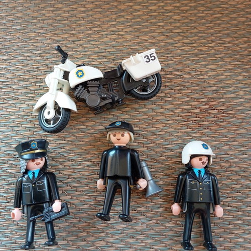 Playmobil police figures and motorcycle set