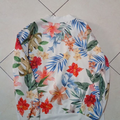 Cardigan with floral pattern used, size M
