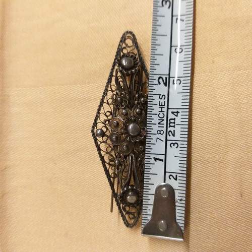 Silver filigree rhombus-shaped pin very old