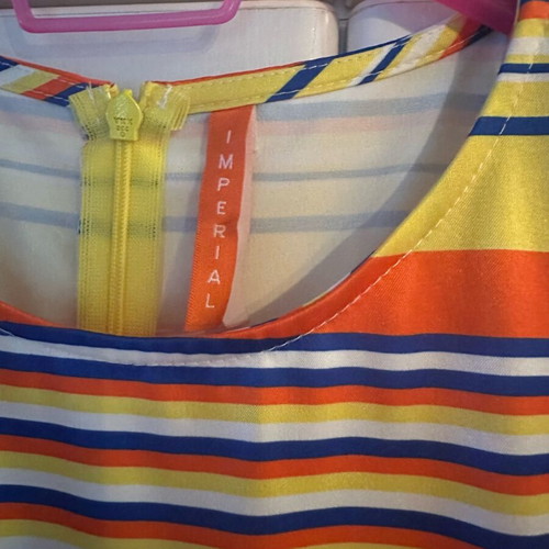 Dress medium like new with thick fabric and colorful stripes