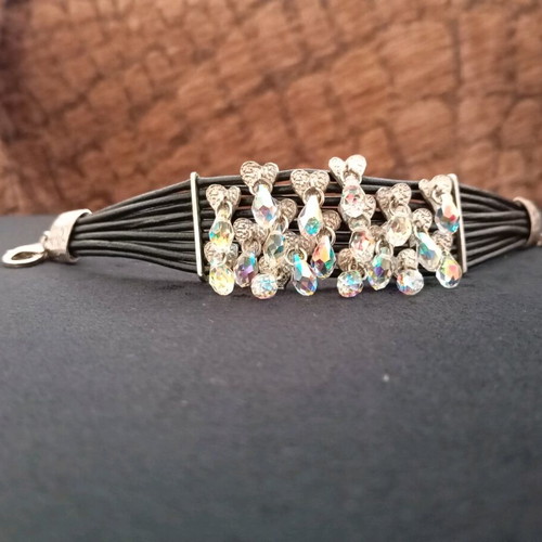 Leather women's bracelet with decorative hearts and rhinestones like new