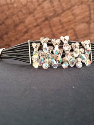 Leather women's bracelet with decorative hearts and rhinestones like new