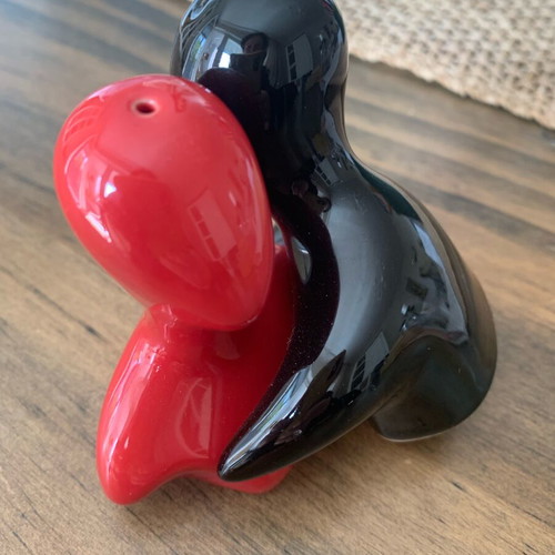 Salt and pepper shakers hugging pair like new