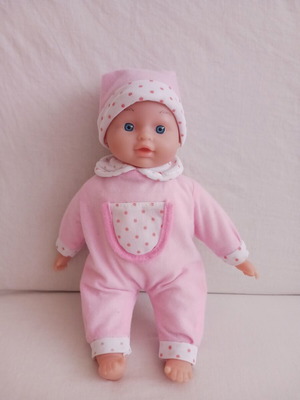 Baby doll with pink clothes like new