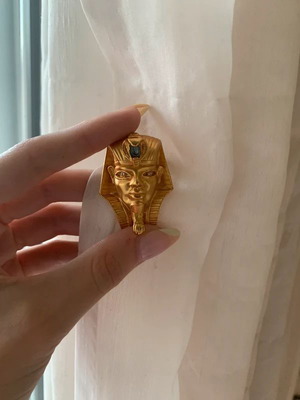 Egyptian pin like new, gold-plated with rhinestones