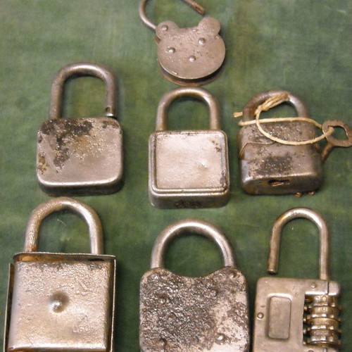 Collection of seven used old padlocks in various sizes