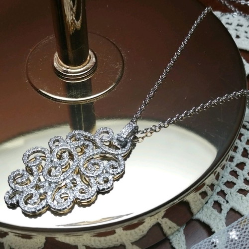 Necklace with cloud motif new, set with earrings