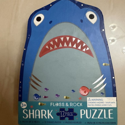Puzzle used, children's shark shape