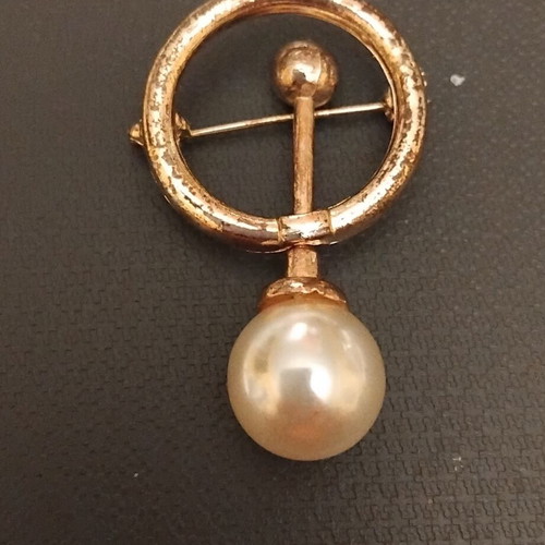 Pin with pearl used, gold color, slightly rusted