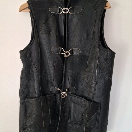 Leather sleeveless vest black with fur lining like new