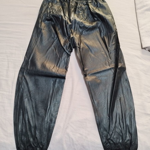 Leather pants like new, elastic waist and cuffs, black