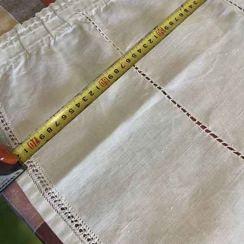 Two handmade linen window curtains with cutwork embroidery and openwork