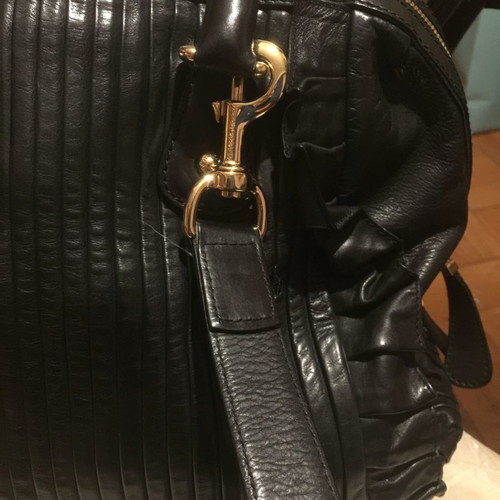 Dolce Gabbana shoulder bag used, black leather with leopard interior