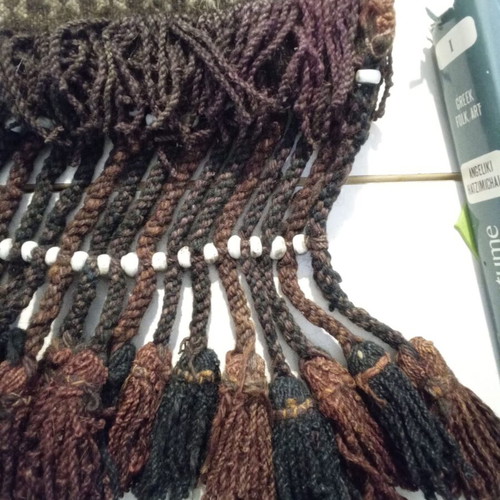 Traditional tagari used with glass beads, handmade wool