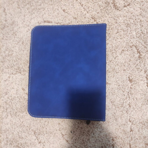 Toploader binder with 112 pockets and zipper, excellent condition