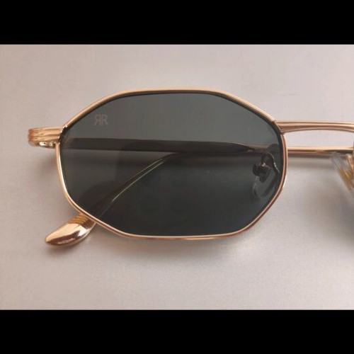 Red Raven sunglasses with gold frame, black lenses