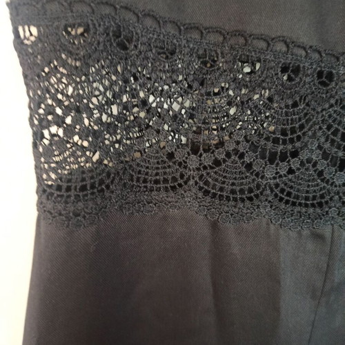 Regalinas black one-piece jumpsuit medium with perforated embroidery like new