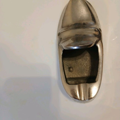 Metal ashtray in shoe shape like new