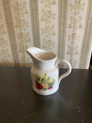 Small used jug with designs