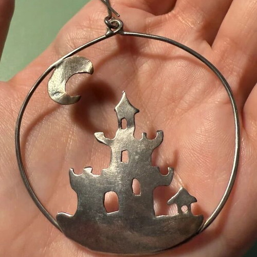 Handmade castle earring like new, silver and gold colors