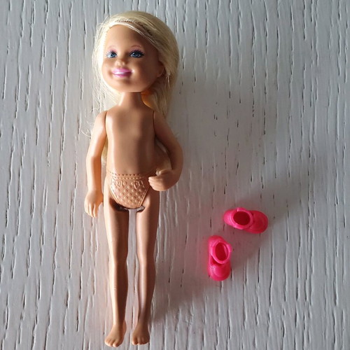 Barbie girl with her shoes used