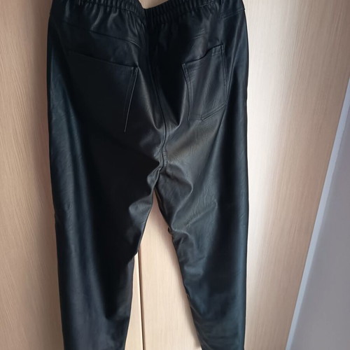 Black faux leather pants with button and elastic waist, size 3