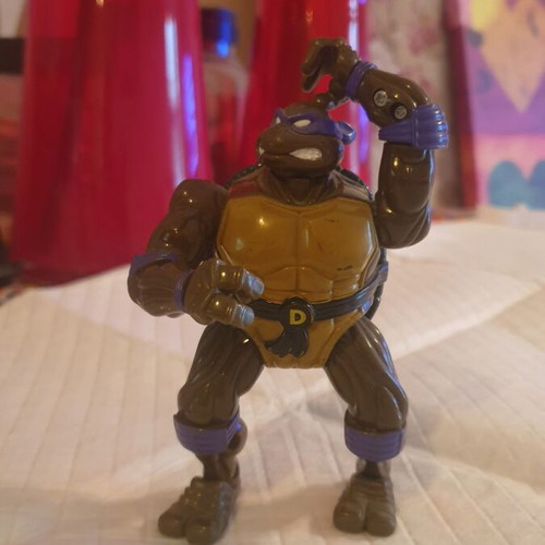 Donatello Ninja Turtles figure used with two Power Rangers gift