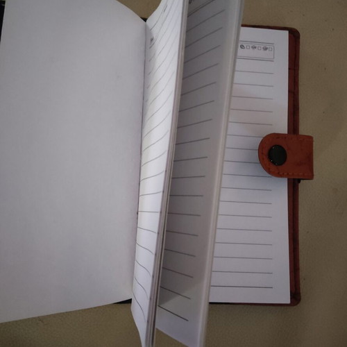 Chenbo pocket diary with brown faux leather cover, like new