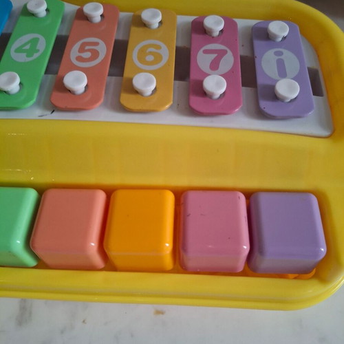Xylophone with piano used children's toy