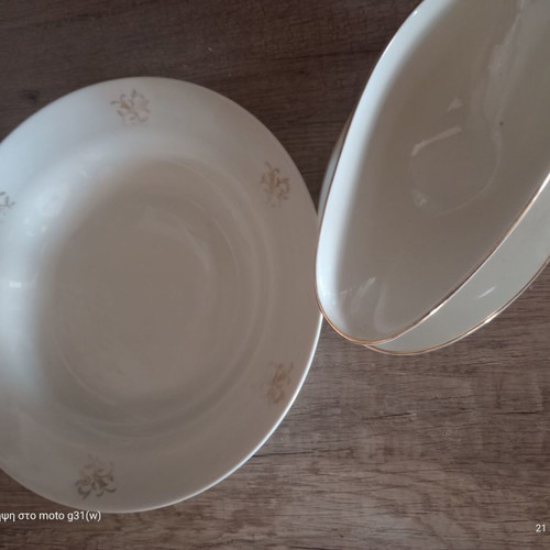 Gravy boat and deep plate used with floral patterns