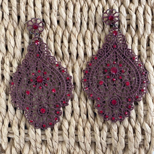 Long burgundy earrings used with color wear